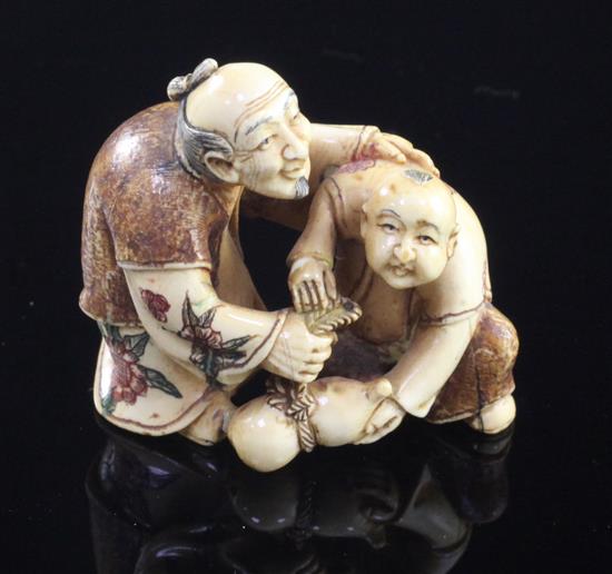 A Japanese ivory polychrome decorated netsuke, first half 20th century, height 4cm